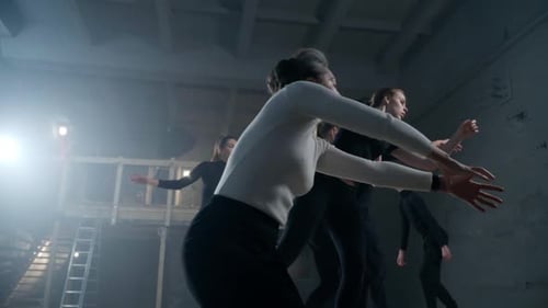 Bottom Angle View of Talented Theater Director Talking Moving Slowly with Actors and Actresses