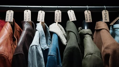 Jackets on Clothing Rack with Black Friday Tags
