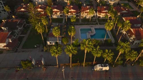 Aerial View A Stunning Seafront Villa Complex Offers a Peaceful Atmosphere with a Pool and Swaying