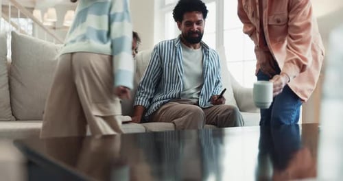Family Relaxing Together on Couch at Home