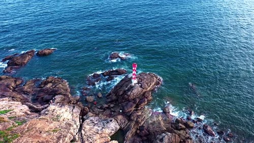 Aerial Top view of a transparent blue sea with beautiful waves at sunny day in summer. air of ocean
