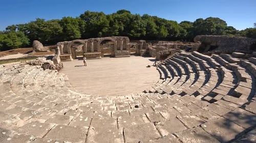 Panning at the entrance of the theater in the archaeological ruins of Butrint or Butrinto National P