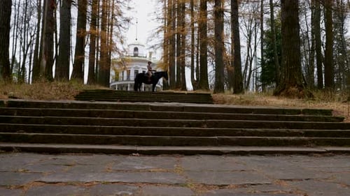 Noblewoman on Horseback in Old Royal Garden in Autumn Day Fulllength Shot Historic Reconstruction