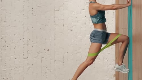 Healthcare and Wellbeing Advertisement Concept Woman Fitness Coach Doing Knee Back Rise with Band