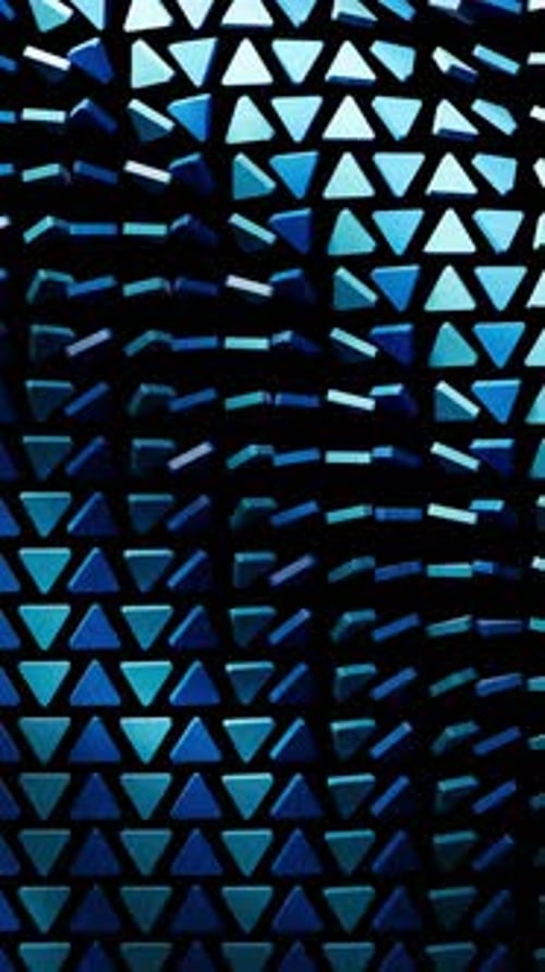 Dynamic Blue Triangle Array Waving Background Loop