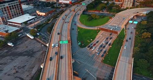 Flying above the highways with lively traffic. Philadelphia roads from aerial perspective.