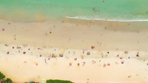 Aerial Drone view flying over tropical sea Beautiful seashore. Kata Beach Thailand