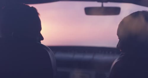 4k video footage of a young attractive couple on a road trip