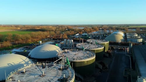 Aerial view of industrial plant with tanks, United Kingdom.