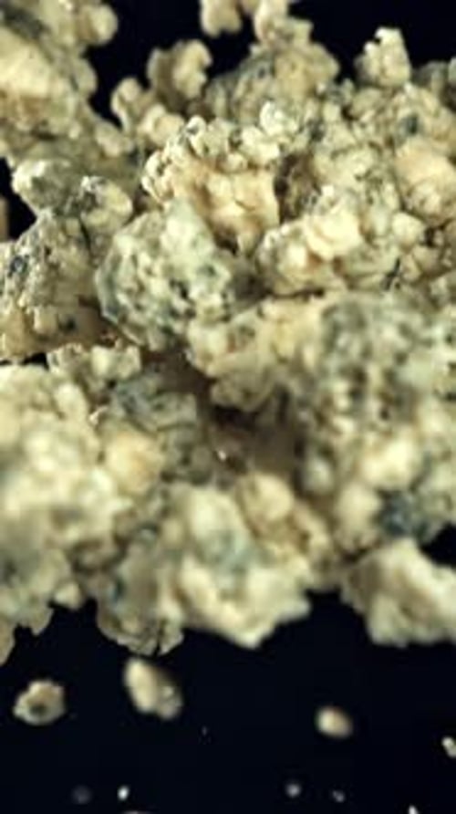 Super Slow Motion Blue Cheese Pieces Filmed on a Highspeed Camera at 1000 Fps