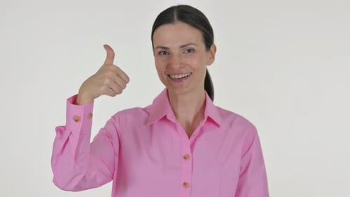 Smiling Woman Gives Thumbs Up on White Background