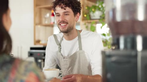 Barista serving customer, smile in coffee shop with hot drink, professional