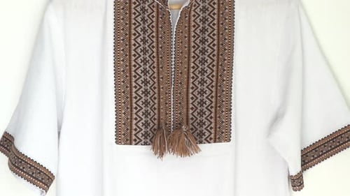 Ukrainian Clothes Embroidered Shirt Brown Threads Background Vyshyvanka is a Symbol of Ukraine