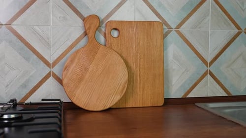 Wooden Cutting Boards on a Stylish Kitchen Counter