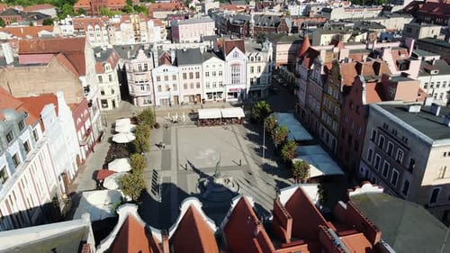 Aerial View of Colorful Buildings Over a Beautiful Central Square in Europe, 4K