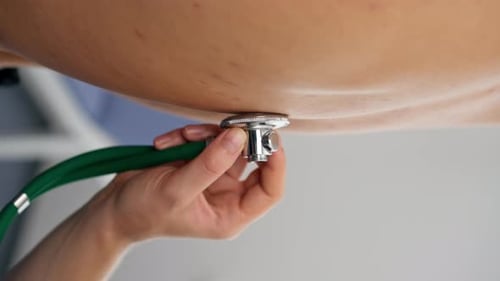 Vertical Video Close Up in a Modern Clinic in Small Therapist s Office a Young Girl Doctor with a