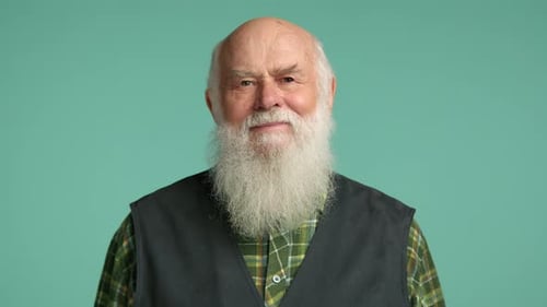 Close Up of Smiling Senior Man with White Beard