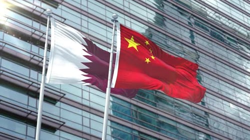 Qatar and China Flags Waving on Modern Building Backdrop