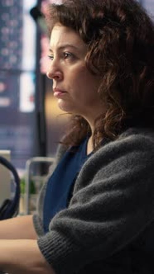 Vertical Video Young Woman Programming Software Code on Her Computer