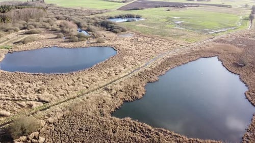 Scenic Aerial View of Rural Wetland Ponds