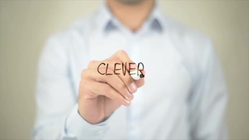 Man Writes 'Clever' On Transparent Screen