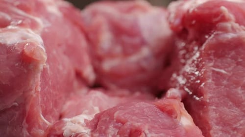 Chef Butcher Cutting Pork Meat with Knife on Kitchen Cooking Mexican Traditional Food Man Cut Big