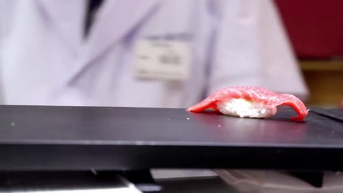 Sushi Chef Preparing Nigiri Close Up