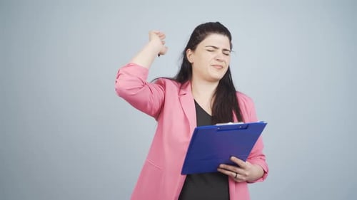 Woman Experiencing Hot Flash with Clipboard