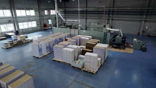 Spacious Workshop of Pulp Mill with Stacks of Blank Paper Sheets