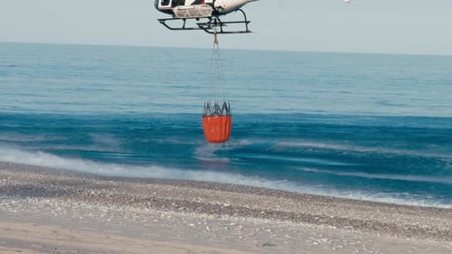 Firefighting Helicopter Over the Ocean