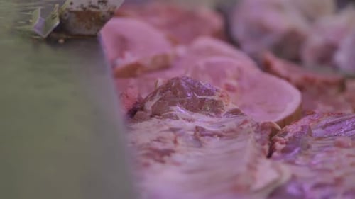Close-up of red beef and pork meat in butcher shop. Food safety. Consumption. Argentina.