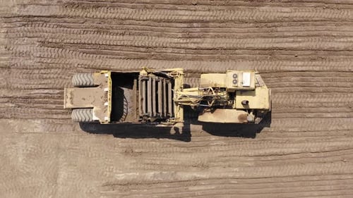 Large Elevating Scraper working at an Urban development site