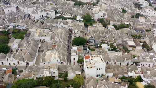 The traditional Trulli houses in Alberobello city, Apulia, Italy. Cityscape over the traditional roo