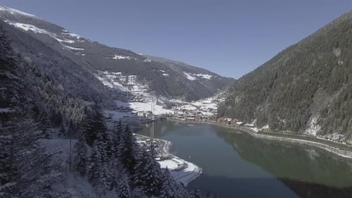 Aerial View of Snow Covered Town on Lakeside