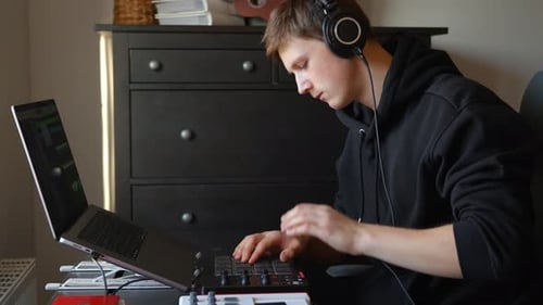 Home Studio Musician Playing MIDI Drum Pad Controller