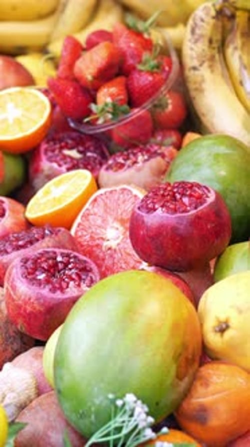 Colorful Fruit Display at Market Sale in Sunny Environment