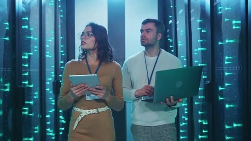 Data Team Working in Modern Server Room