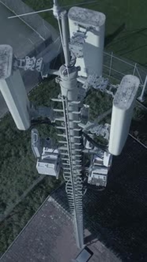A Captivating Aerial View of a Contemporary Modern Cell Tower Showcasing Its Communication Equipment