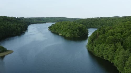 Beautiful Lake System From Above Picturesque Island Covered with Green Trees Aerial Flight Over Blue