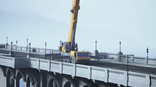 Gran grúa automotriz en el puente en construcción