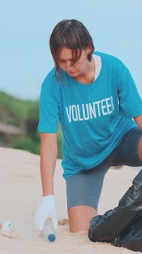 Helping Hands Gather Trash to Protect the Beach and Marine Life