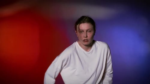 Scared and Excited Dancer Woman Looking at Camera Portrait in Studio Mad Eyes Crazy Actress