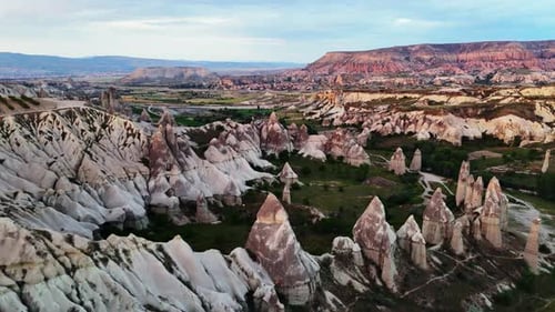 Aerial Panorama of Cappadocia's Iconic Rock Formations at Sunrise