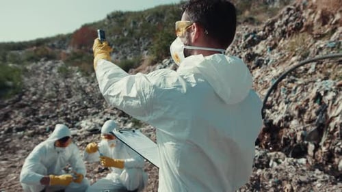 In the Field of Scientific Investigation Researchers Don Protective Gear at a Remote Site