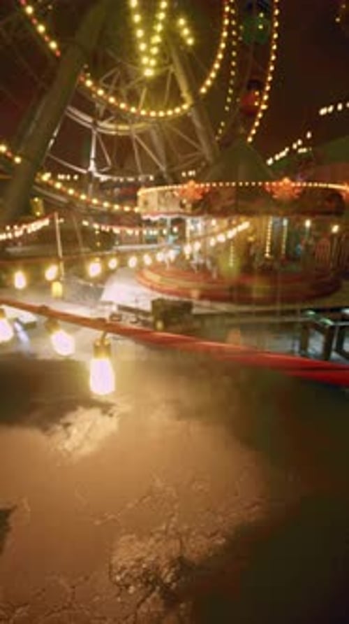 Animated Ferris Wheel and Carousel at Night with Festive Lights