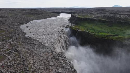 Dettifoss Waterfall in Iceland with Cascading Water and Mist