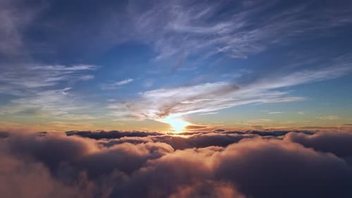 Majestic Aerial View of Clouds at Sunrise