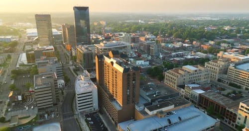 Downtown district of Lexington in Kentucky, USA with high office buildings at sunset
