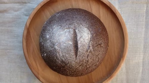 Baked Bread Loaf of Bread Fresh Bakery Products on Wooden Board Healthy Food Concept Top View Slices