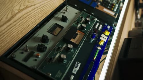 old displays of professional analog volume meters in a recording studio measuring and showing